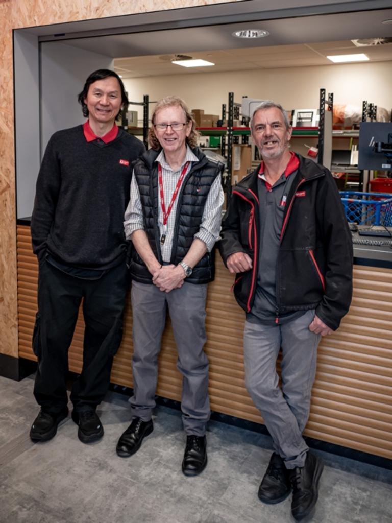 澳洲郵政的三個員工 澳洲郵政的三個員工